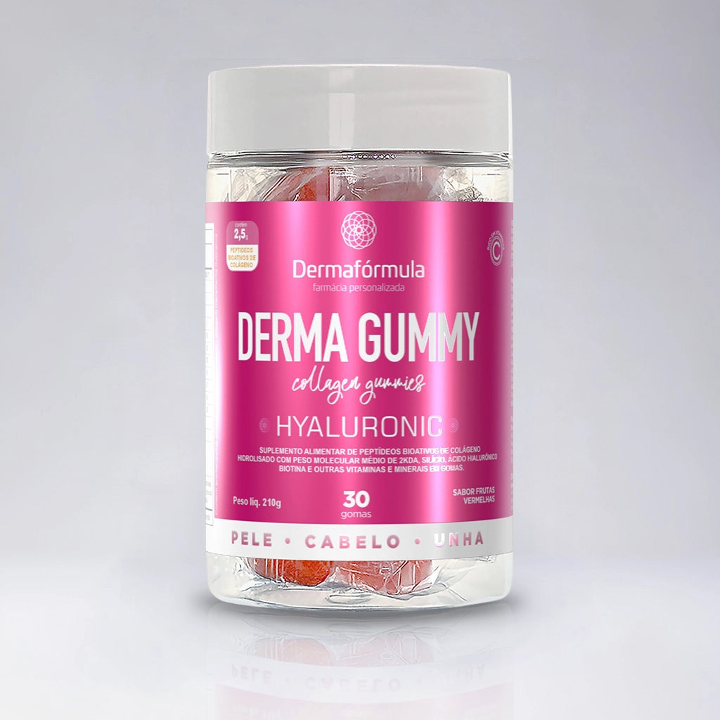 Dermafórmula Melhor Farmácia de Manipulação em Santos | Frasco cilíndrico transparente exibindo gomas alaranjadas no interior. O rótulo rosa destaca os textos 'Derma Gummy Collagen Gummies' e 'Hyaluronic' em branco. Na base do rótulo, as palavras 'Pele, Cabelo, Unha' reforçam a indicação do produto. O logotipo da Dermafórmula e o sabor frutas vermelhas estão em destaque.